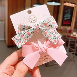 Kẹp tóc cho bé gái set 2 chiếc đính nơ rất dễ thương PK36