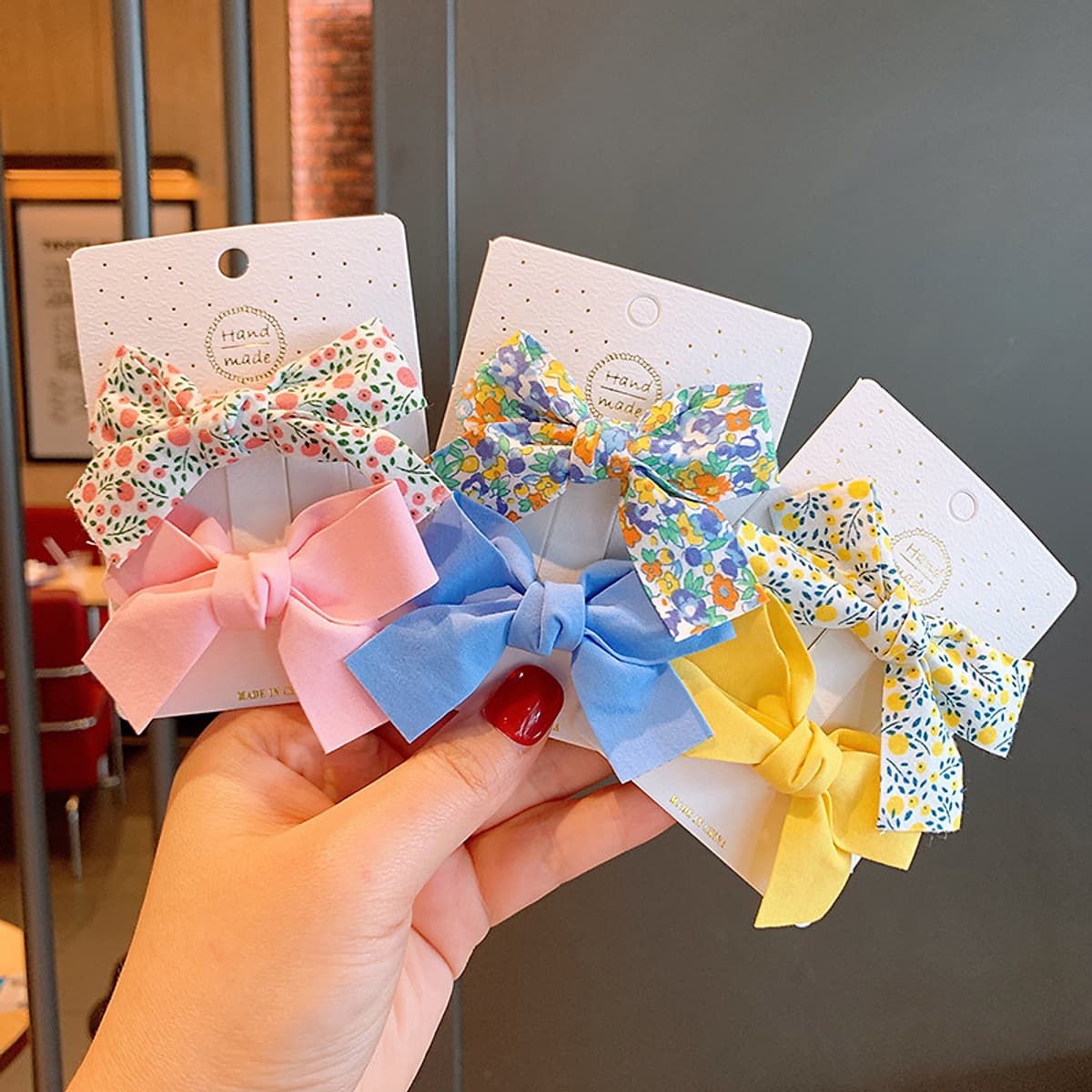 Kẹp tóc cho bé gái set 2 chiếc đính nơ rất dễ thương PK36