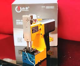 MÁY MAY BAO CẦM TAY GK9-200 KÈM 5 ỐNG CHỈ MAY.